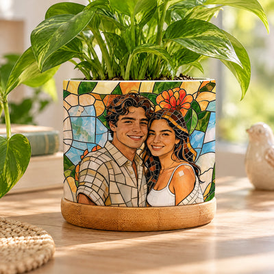 Personalized plant pot couple photo with a smiling young couple in mosaic style, green pothos plant on a sunny table