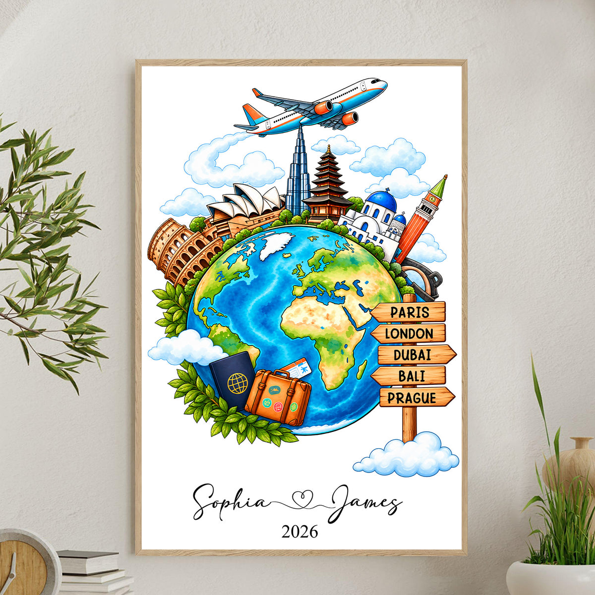 Watercolor travel globe personalized poster framed on a wall with signpost city names and a green plant nearby