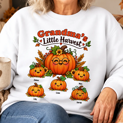 Grandma's Little Harvest Personalized Sweatshirt worn close up, showing pumpkin characters with five names