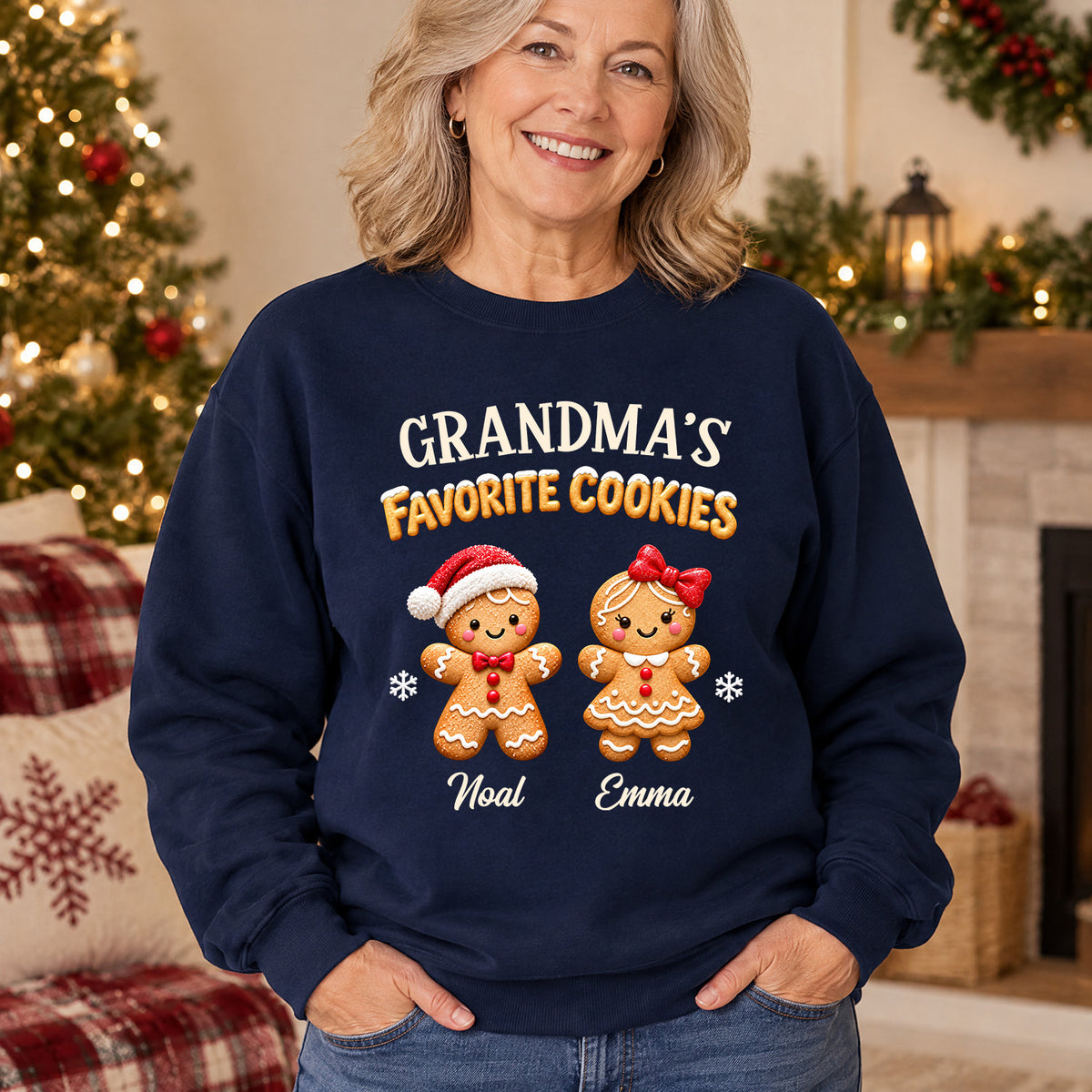 Personalized Crewneck Sweatshirt Gingerbread worn by smiling woman beside a lit Christmas tree, hands in pockets