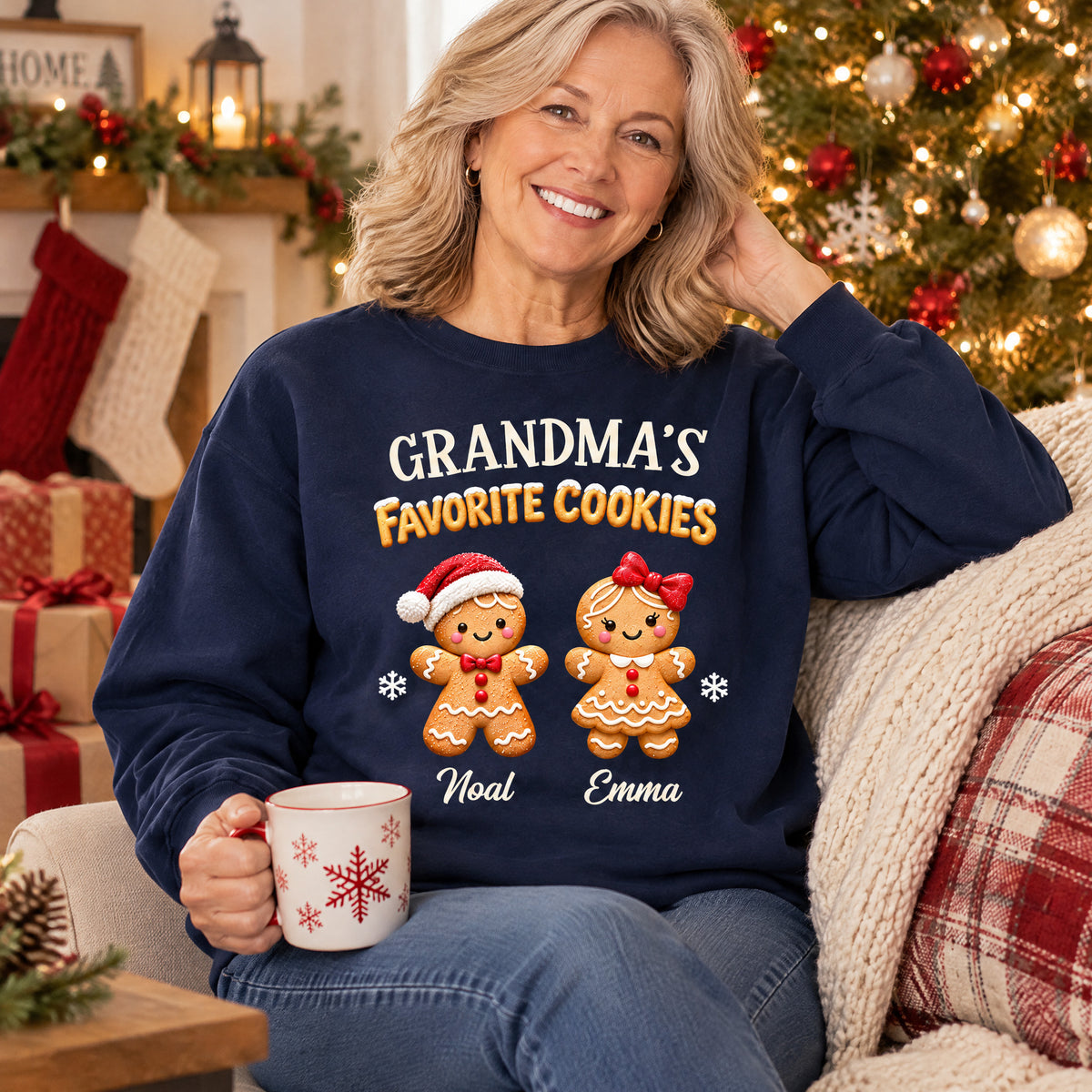 Personalized Crewneck Sweatshirt Gingerbread worn by woman holding a snowflake mug near stockings and gifts