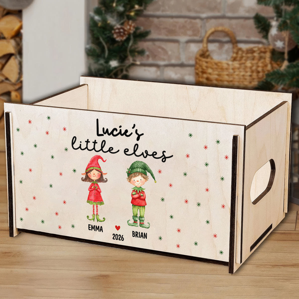 Personalized wooden treasure chest front view on a wood floor, with a side handle cutout and a wicker basket behind